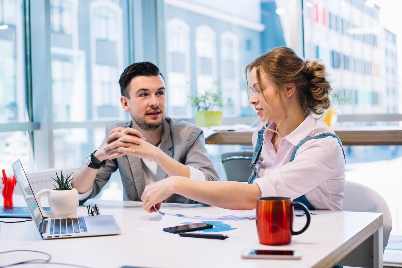 Professional financial analysis workspace showing budget planning tools and benchmarking reports
